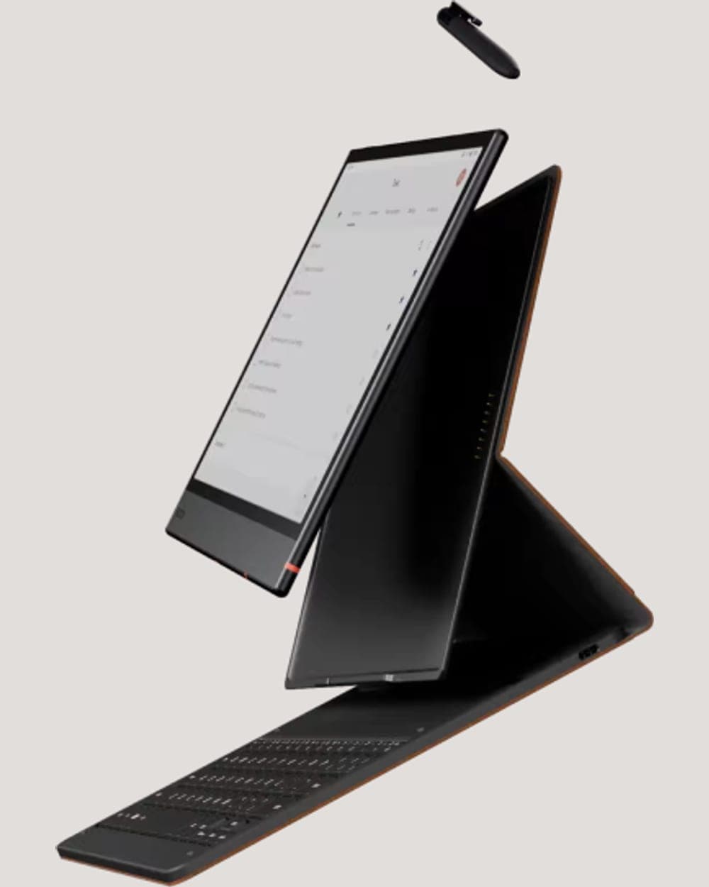 Un BOOX Note Air6 C en suspension au-dessus de son clavier magnétique ouvert, le stylet Pen3 au-dessus